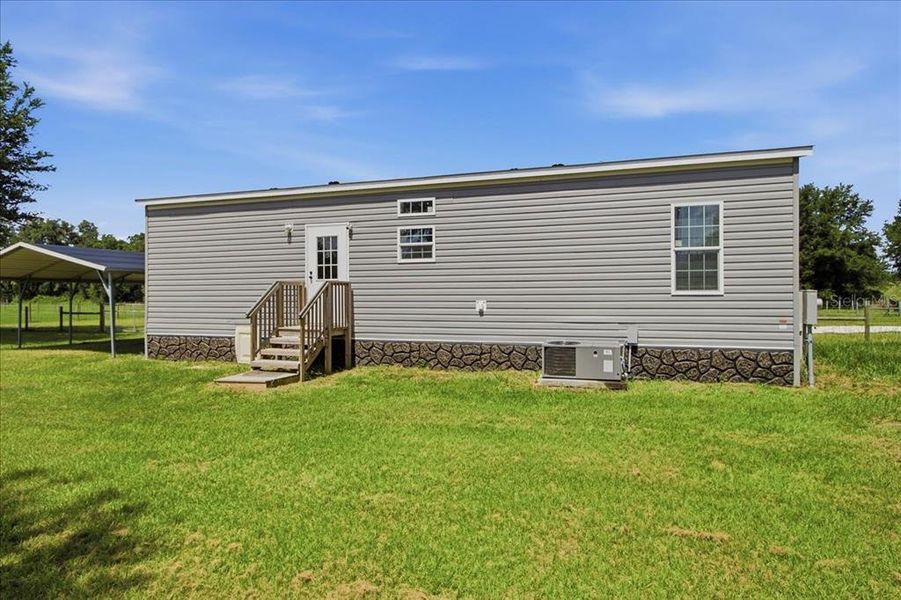 Exterior details and patio area of a home in , Bushnell (Image 23).