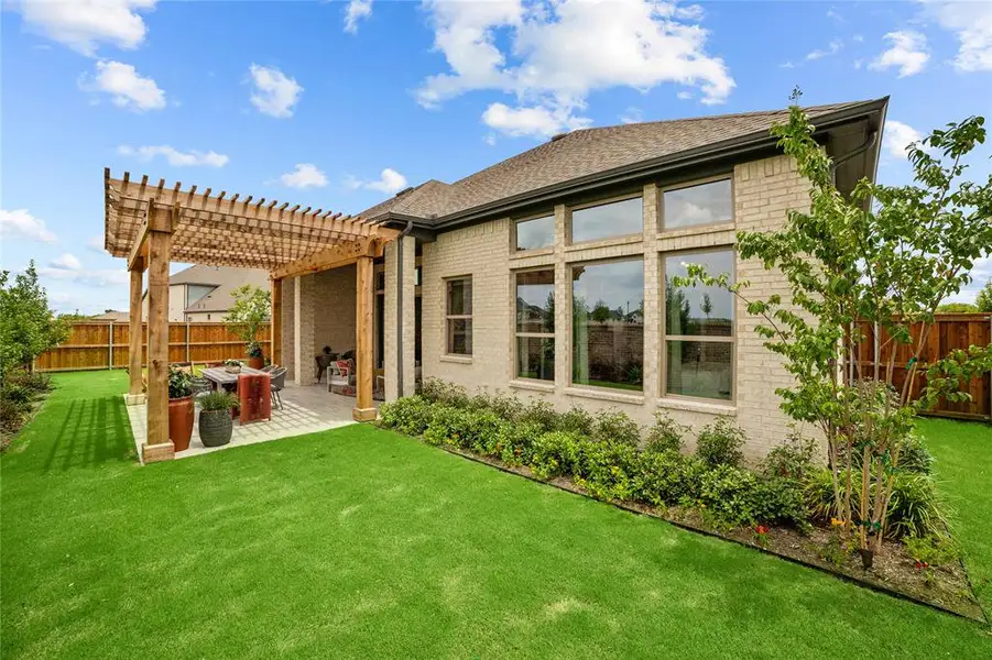Exterior details and patio area of a home in South Pointe Manor Series, Mansfield (Image 2). Exterior details and patio area of a home in South Pointe Manor Series, Mansfield (Image 2).
