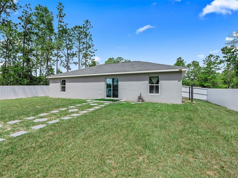 Exterior details and patio area of a home in , Ocala (Image 28).