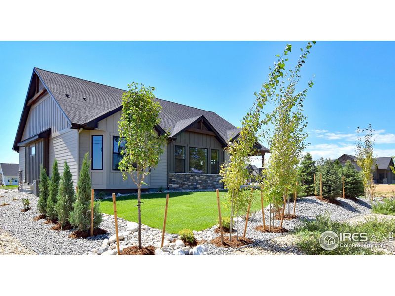 Front exterior of a new home in , Berthoud, CO, highlighting curb appeal (Image 28).