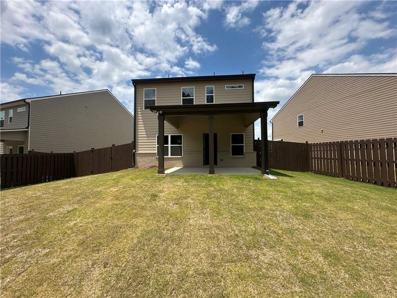 Exterior details and patio area of a home in Kentmere, Auburn (Image 27).