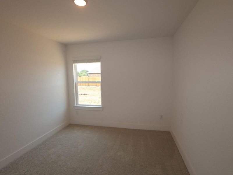 Spacious, unfurnished interior of a new home in Hallimore Ranch, Rosenberg (Image 23).