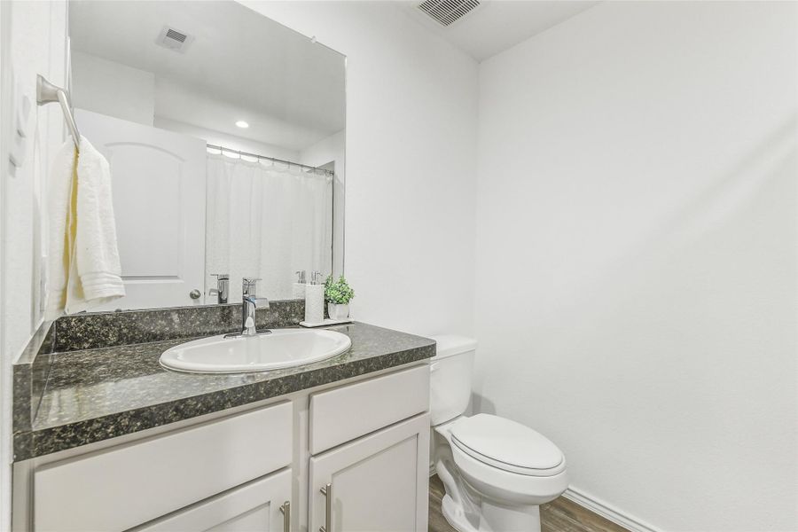 Furnished interior view inside a new home in Summerwood Trails, Willis (Image 24). Furnished interior view inside a new home in Summerwood Trails, Willis (Image 24).