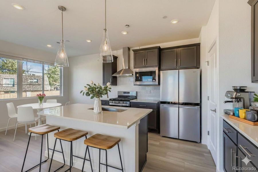 virtually staged kitchen / dining