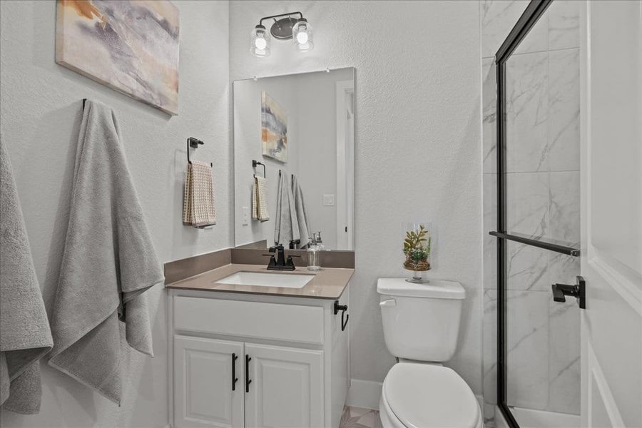 Furnished interior view inside a new home in 6 Creeks, Kyle (Image 36).