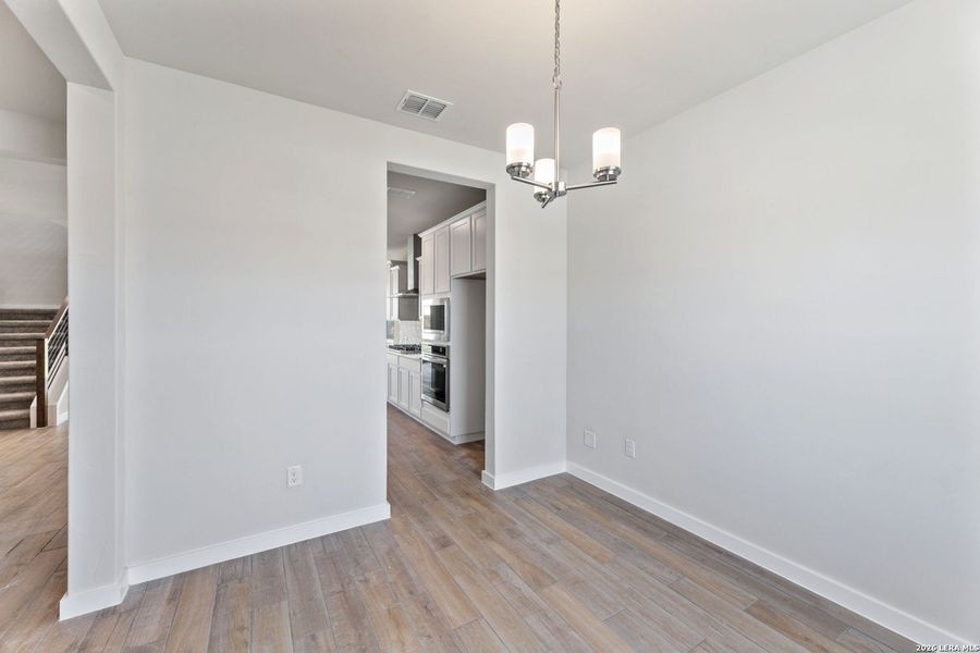 Spacious, unfurnished interior of a new home in Hunter's Ranch, San Antonio (Image 8).