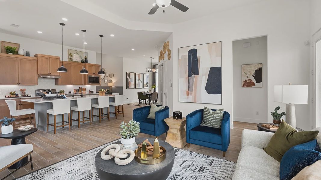 Representative furnished interior of a home built from the Hillcrest by Chesmar Homes in Artavia, Conroe (Image 7).
