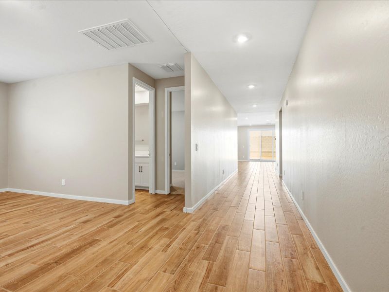Spacious, unfurnished interior of a new home in White Tank Foothills Signature Series, Waddell (Image 12). Spacious, unfurnished interior of a new home in White Tank Foothills Signature Series, Waddell (Image 12).