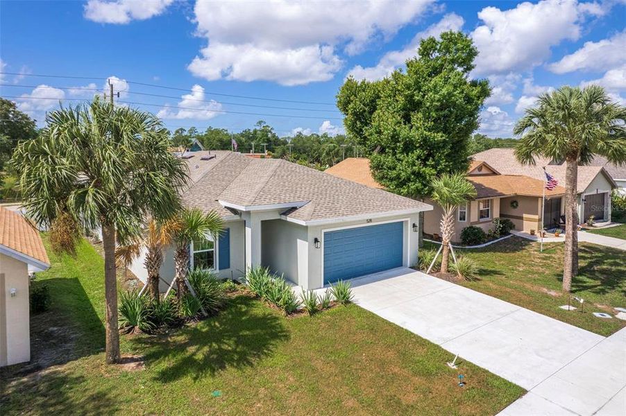 Front exterior of a new home in , Port Charlotte, FL, highlighting curb appeal (Image 26).