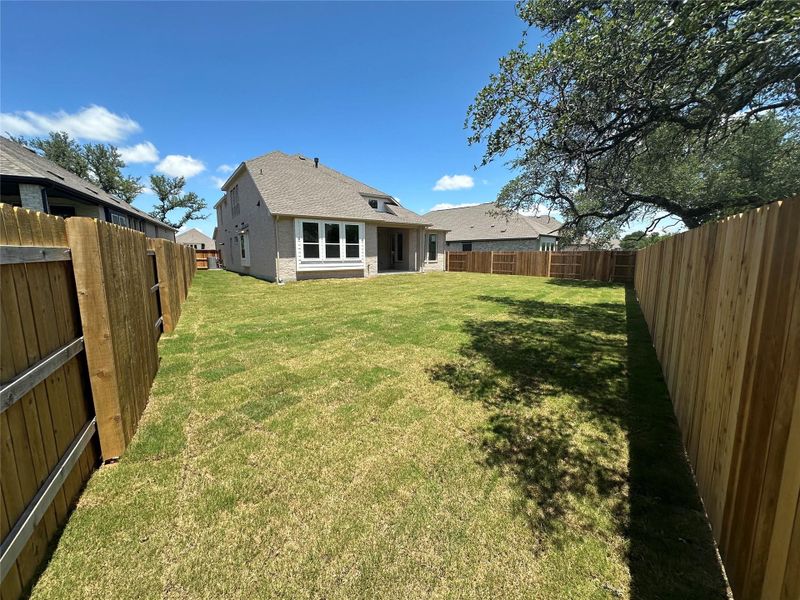 Rear of Home and Private Backyard
