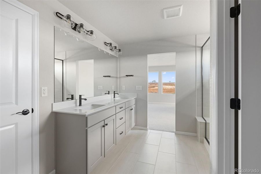 Furnished interior in a model home at The Legacy Collection at Talon Pointe in Thornton (Image 9).