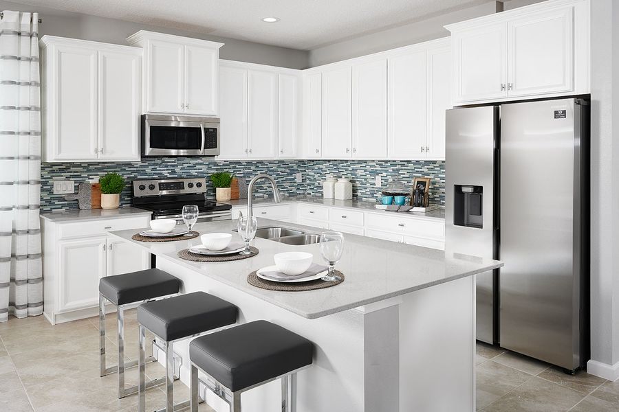 Representative furnished interior of a home built from the Daytona by Park Square Residential in Leela Reserve, Tavares (Image 4).