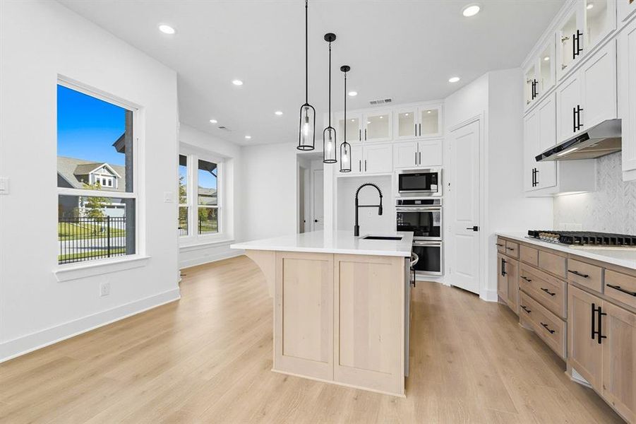 Furnished interior view inside a new home in Walsh: Townhomes - The Patios, Aledo (Image 11). Furnished interior view inside a new home in Walsh: Townhomes - The Patios, Aledo (Image 11).
