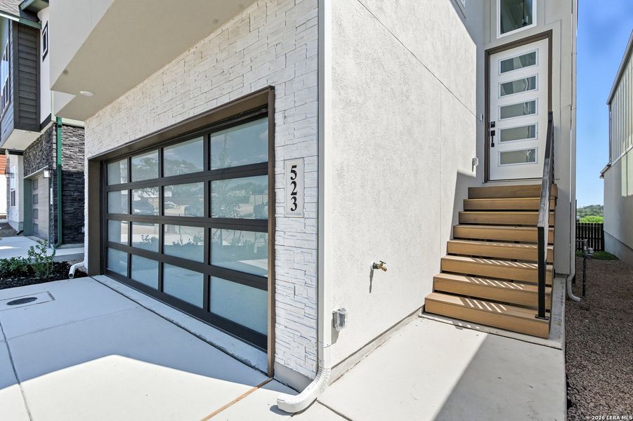 Exterior details and patio area of a home in Centero at Stone Oak, San Antonio (Image 3).