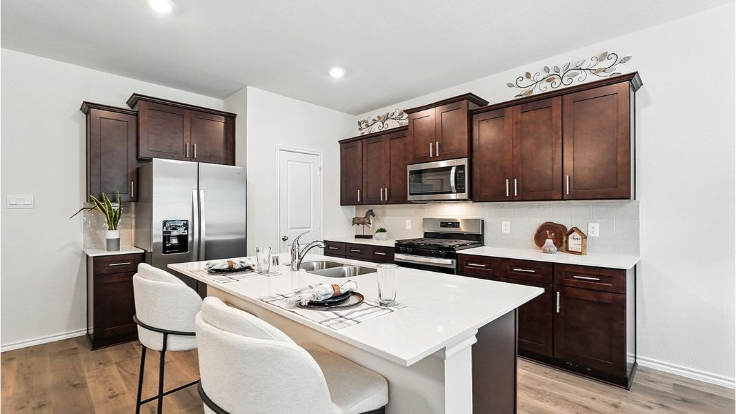Representative furnished interior of a home built from the Naples by D.R. Horton in The Reserve at Timber Creek, Lindale (Image 8).