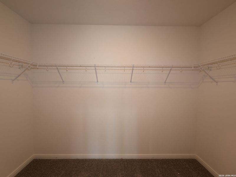 Spacious, unfurnished interior of a new home in Hunters Ranch, San Antonio (Image 26).