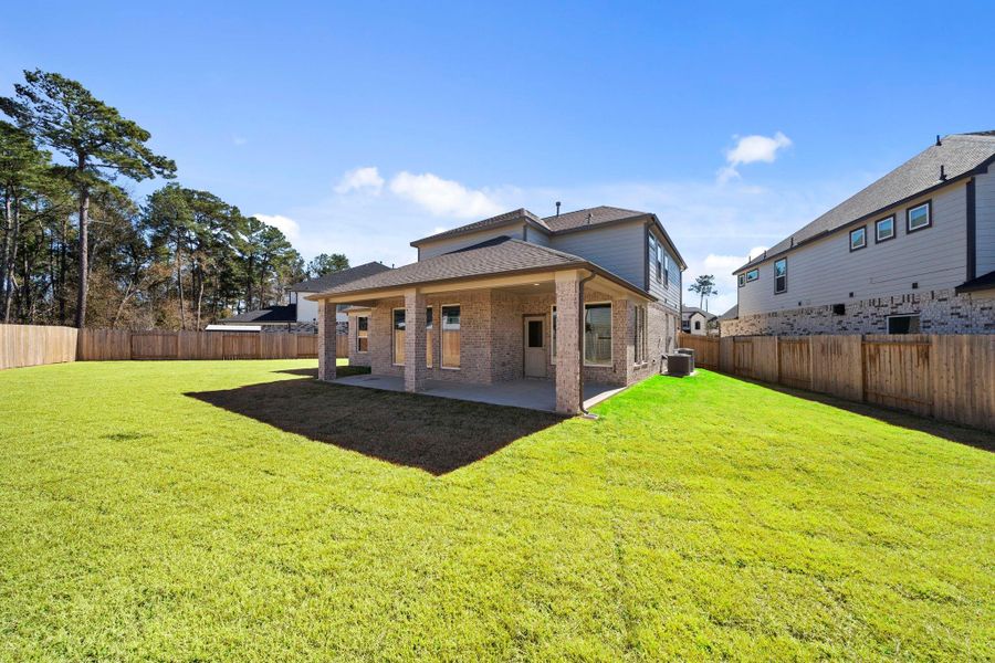 Exterior details and patio area of a home in Barton Creek Ranch, Conroe (Image 3). Exterior details and patio area of a home in Barton Creek Ranch, Conroe (Image 3).