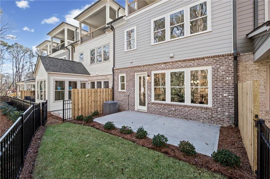 Exterior details and patio area of a home in Devin's Shire - A Kennesaw Tradition, Kennesaw (Image 3).