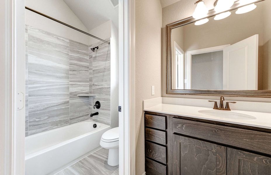 Furnished interior view inside a new home in Bridgeland 60′, Cypress (Image 13).