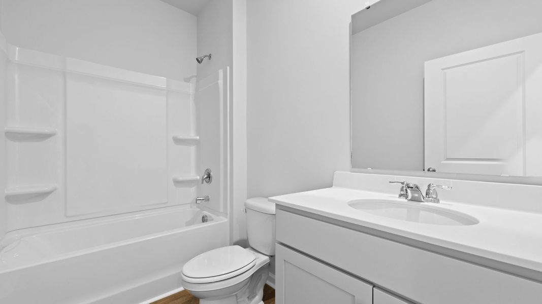 Furnished interior view inside a new home in Pine Hills at Cane Bay, Summerville (Image 12).