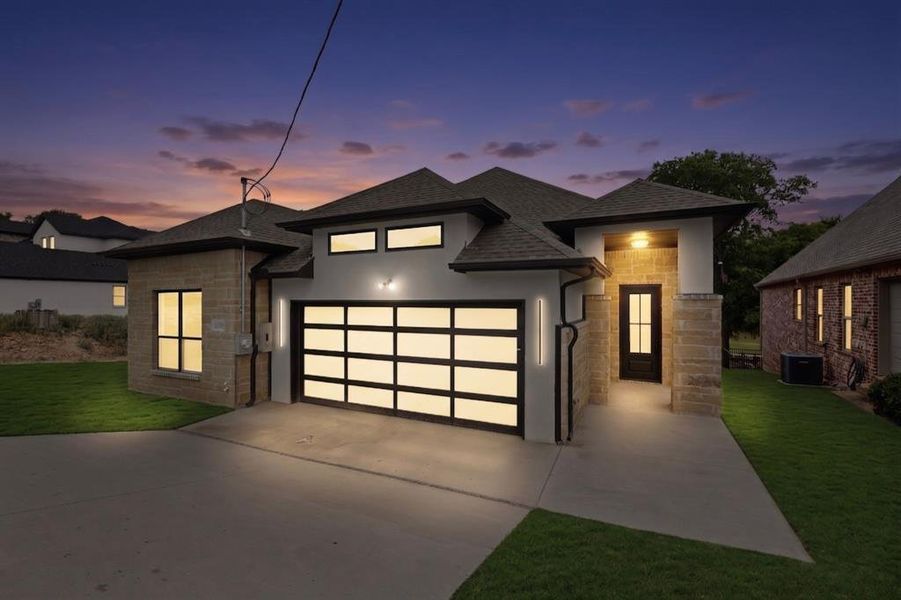 Front exterior of a new home in , Whitney, TX, highlighting curb appeal (Image 1). Front exterior of a new home in , Whitney, TX, highlighting curb appeal (Image 1).