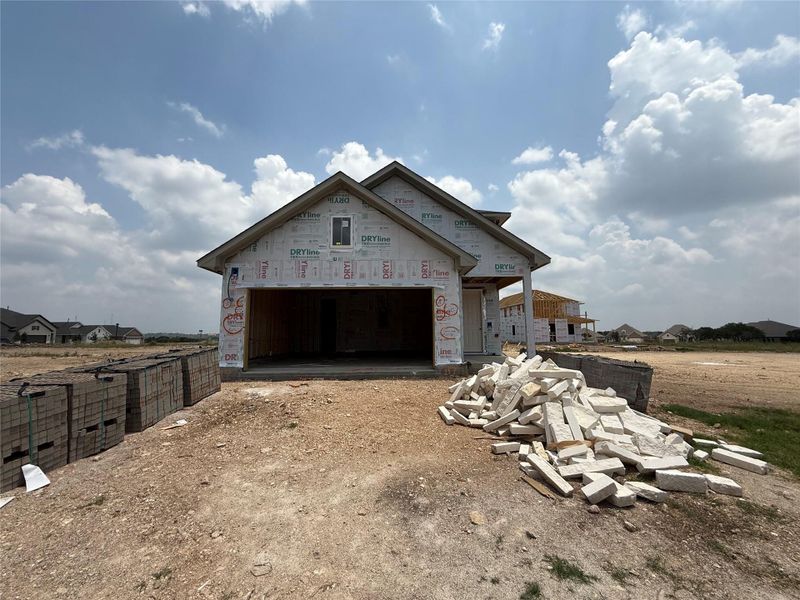 In-progress construction of a new home in The Cottages at La Cima, San Marcos, TX (Image 7). In-progress construction of a new home in The Cottages at La Cima, San Marcos, TX (Image 7).