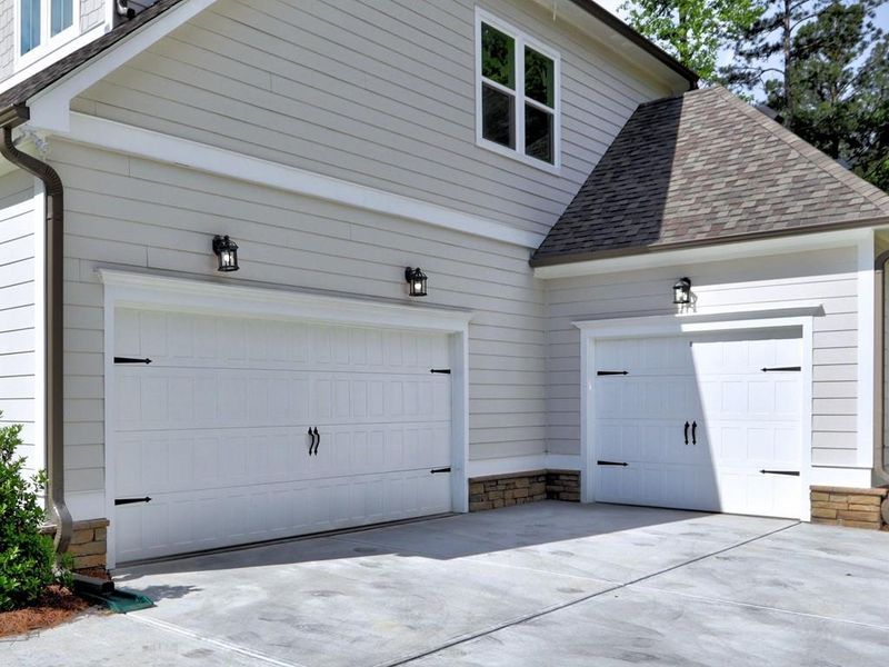 Front exterior of a new home in , Cumming, GA, highlighting curb appeal (Image 23). Front exterior of a new home in , Cumming, GA, highlighting curb appeal (Image 23).