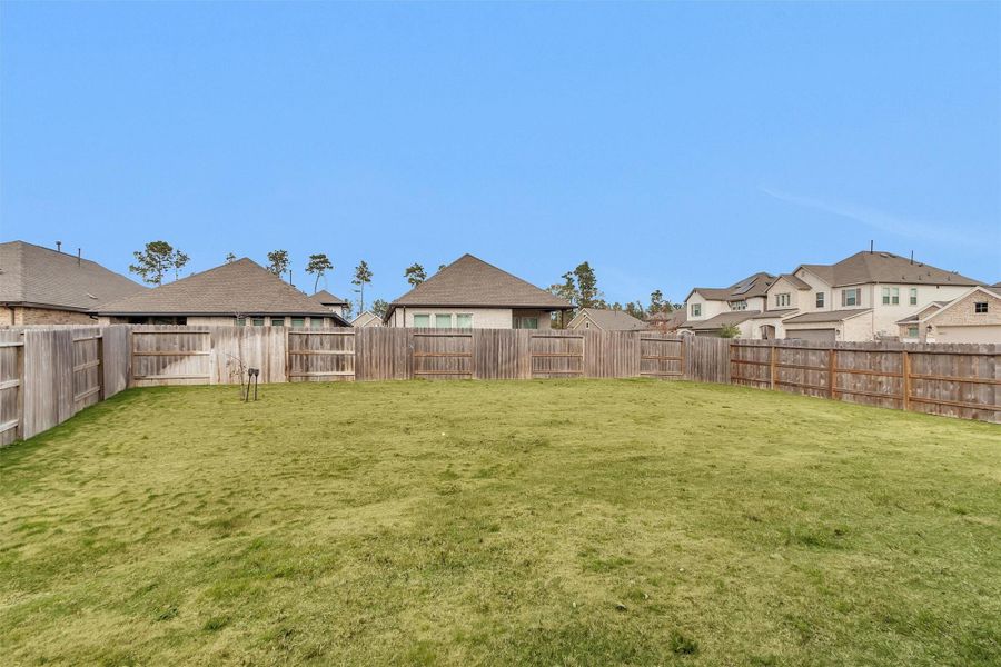 Exterior details and patio area of a home in Artavia: Avante Collection, Conroe (Image 20).