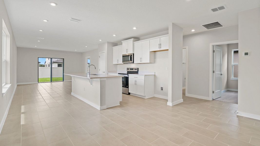 The Atlantic offers a bright open layout with a modern kitchen, island, and connected living space—ideal for everyday living. The Atlantic offers a bright open layout with a modern kitchen, island, and connected living space—ideal for everyday living.