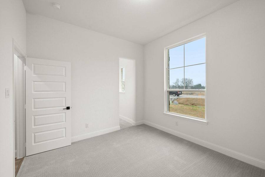Representative unfurnished interior of a home built from the Dickson by Kindred Homes in Oak Creek Ranch, Waxahachie (Image 29).
