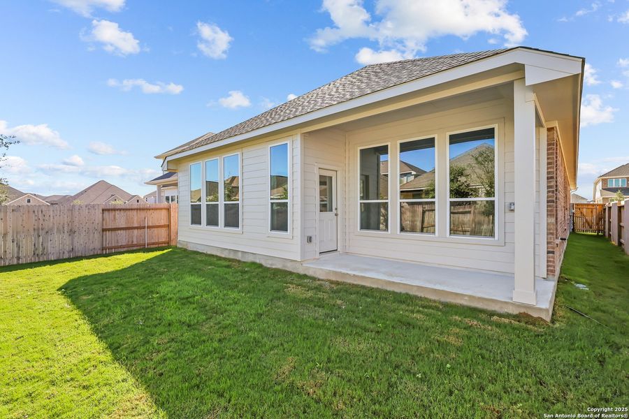 Exterior details and patio area of a home in Stillwater Ranch 45', San Antonio (Image 3).