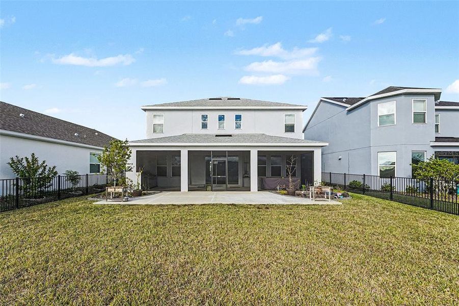 Exterior details and patio area of a home in Eave's Bend at Artisan Lakes, Palmetto (Image 4).