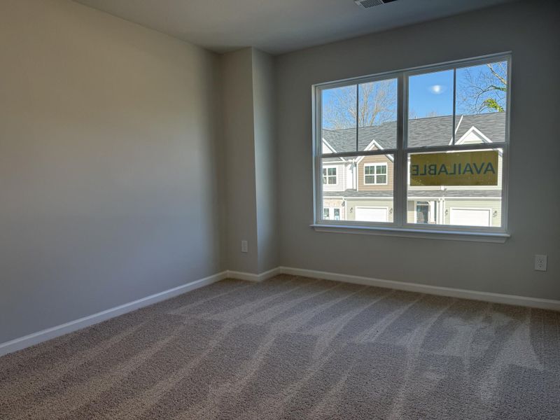 Spacious, unfurnished interior of a new home in East Main Townes, Spartanburg (Image 12).