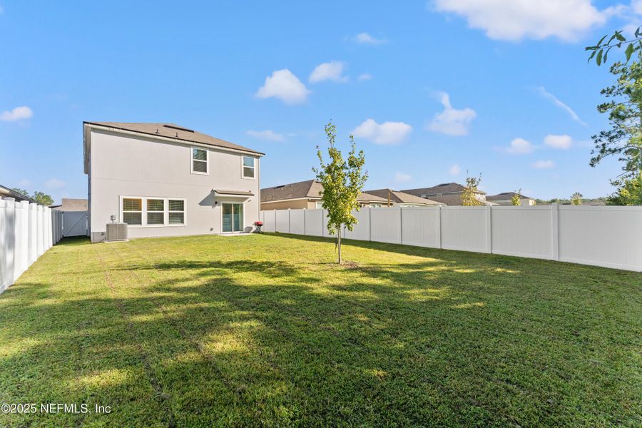 Front exterior of a new home in Cross Creek Express, Green Cove Springs, FL, highlighting curb appeal (Image 22).