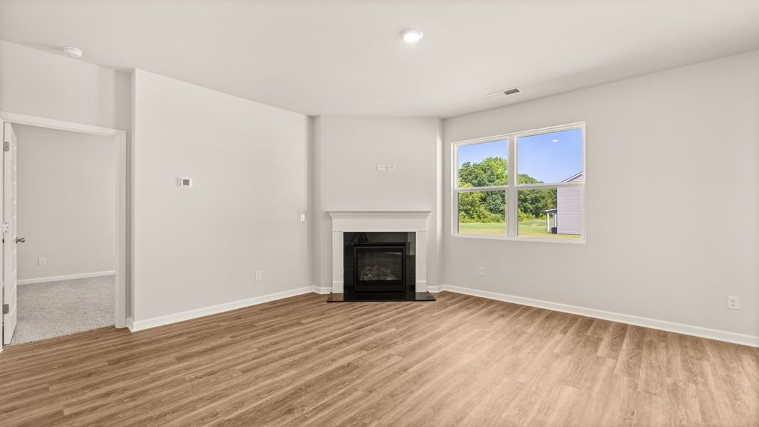 Representative unfurnished interior of a home built from the Elle by D.R. Horton in Preserve at Dove Creek, Statham (Image 14).
