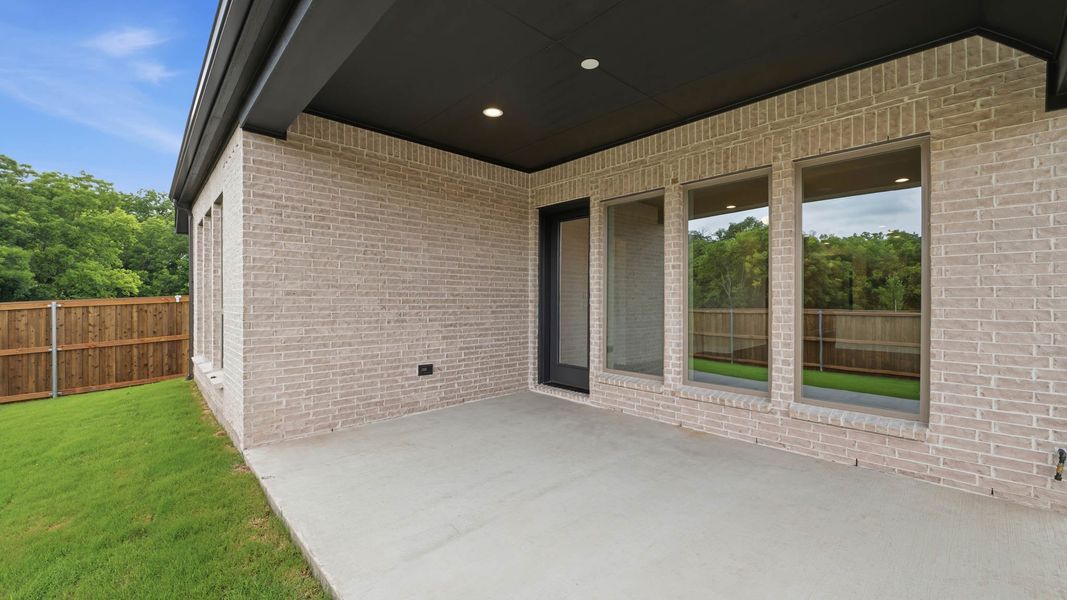 Exterior details and patio area of a home in Trinity Falls, McKinney (Image 4). Exterior details and patio area of a home in Trinity Falls, McKinney (Image 4).