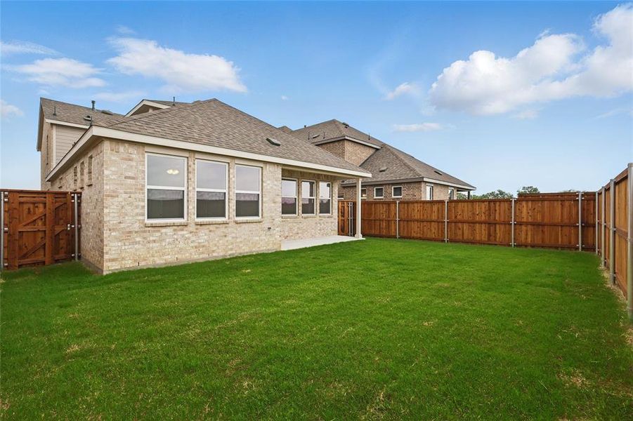 Exterior details and patio area of a home in Bel Air Village, Sherman (Image 2).