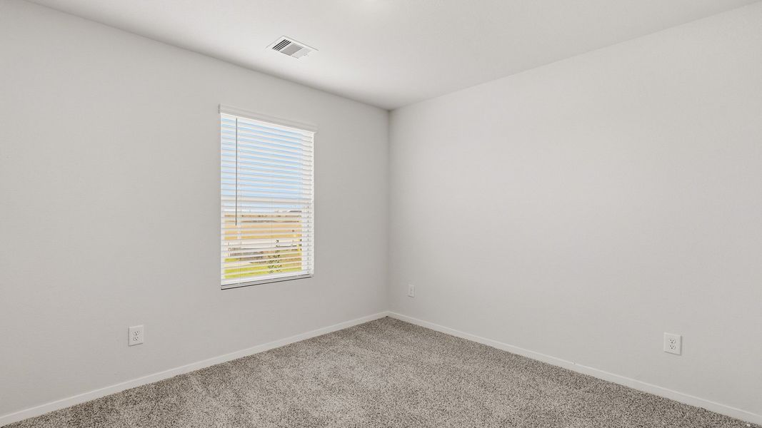 Spacious, unfurnished interior of a new home in Sunterra, Katy (Image 23).