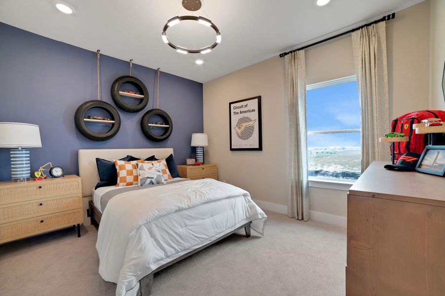 Bedroom with light carpet and recessed lighting