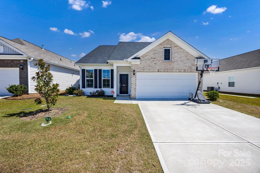 Front exterior of a new home in , Columbia, SC, highlighting curb appeal (Image 1).