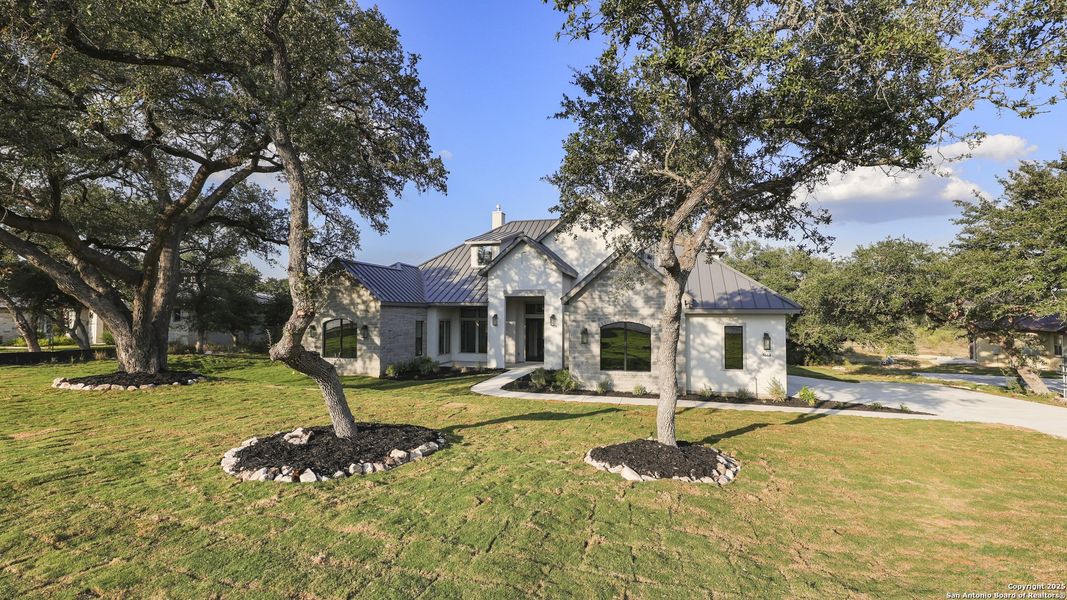 Front exterior of a new home in , New Braunfels, TX, highlighting curb appeal (Image 28).