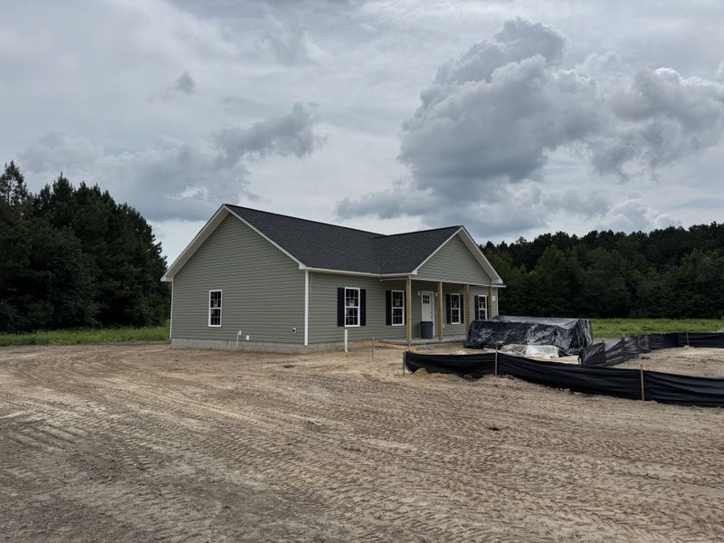 Front exterior of a new home in , St. George, SC, highlighting curb appeal (Image 14).