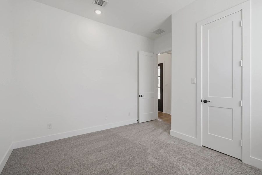 Representative unfurnished interior of a home built from the Malibu by Chesmar Homes in Fulshear Lakes, Fulshear (Image 17).
