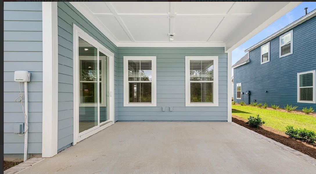 Exterior details and patio area of a home in Midtown at Nexton, Summerville (Image 3). Exterior details and patio area of a home in Midtown at Nexton, Summerville (Image 3).