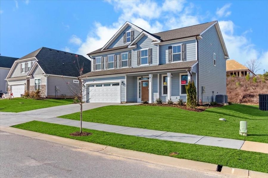 Front exterior of a new home in Crawford Creek, Grovetown, GA, highlighting curb appeal (Image 24).