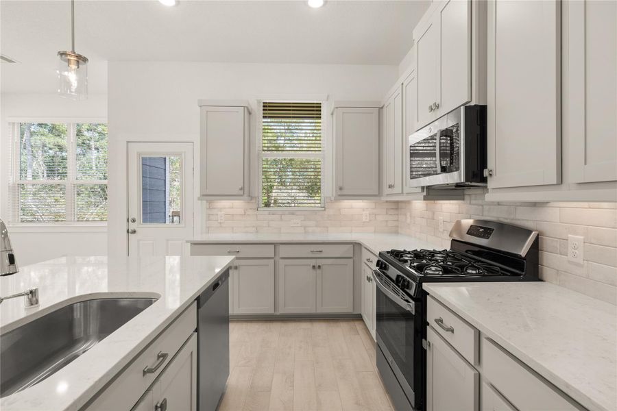 Furnished interior view inside a new home in The Woodlands Hills, Willis (Image 9).