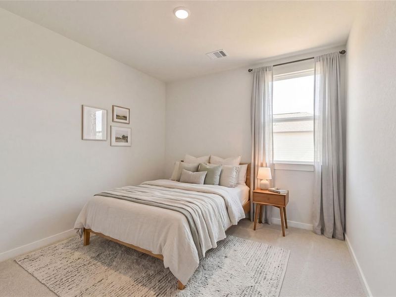 Furnished interior view inside a new home in Spring Branch Crossing, Conroe (Image 9).