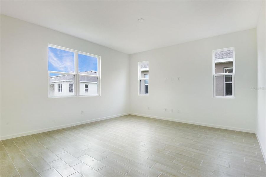 Spacious, unfurnished interior of a new home in Seasons at Grandview Gardens, Deland (Image 12). Spacious, unfurnished interior of a new home in Seasons at Grandview Gardens, Deland (Image 12).