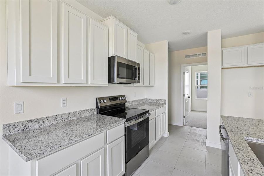 Furnished interior view inside a new home in Hamilton Bluff, Haines City (Image 4).