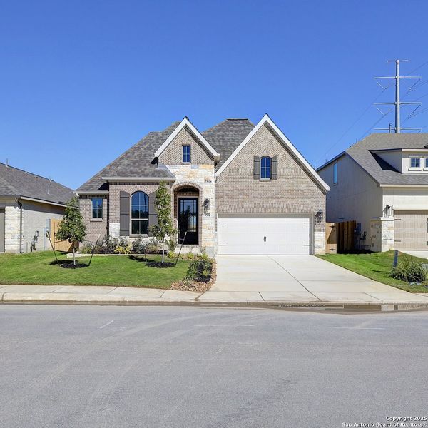 Front exterior of a new home in Haby Hill 50', San Antonio, TX, highlighting curb appeal (Image 2).